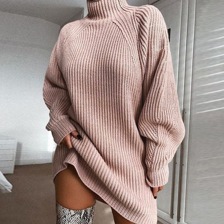 Woman in oversized turtleneck sweater dress