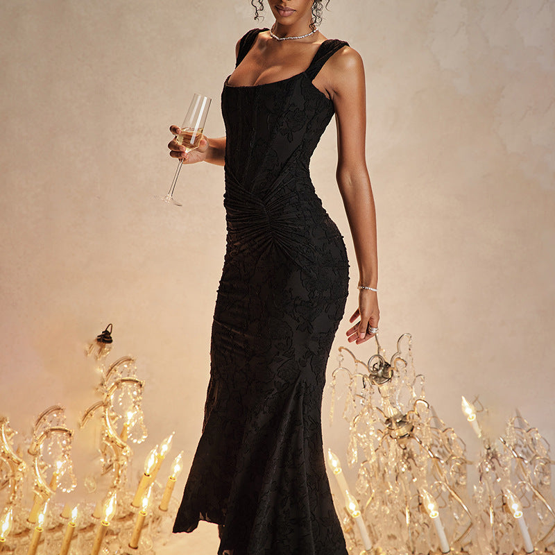 Woman in an off-shoulder mermaid gown
