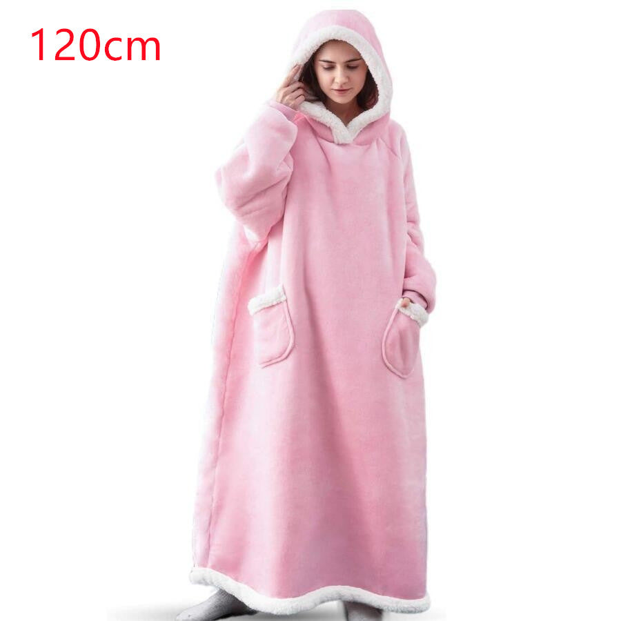 Oversized sherpa hoodie blanket on the couch