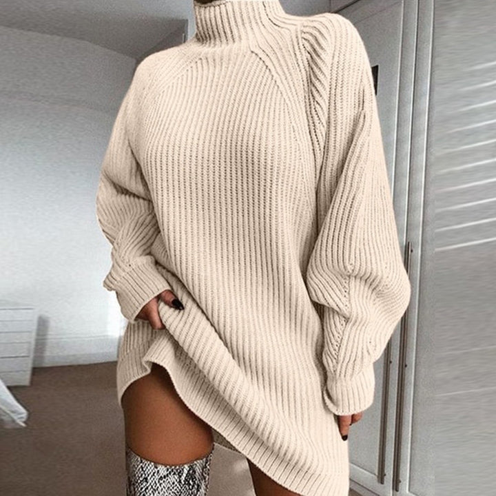 Woman in oversized turtleneck sweater dress