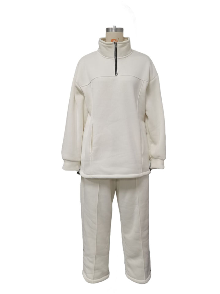 Woman in a half-zip fleece tracksuit