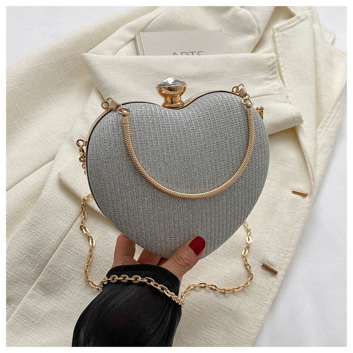 Heart-shaped metallic clutch with chain