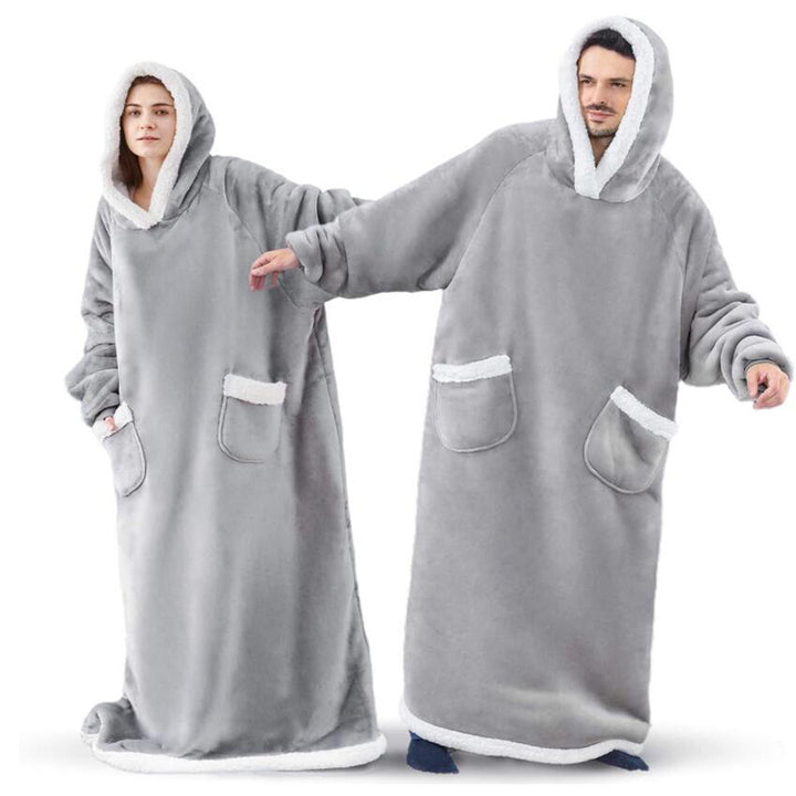Oversized sherpa hoodie blanket on the couch