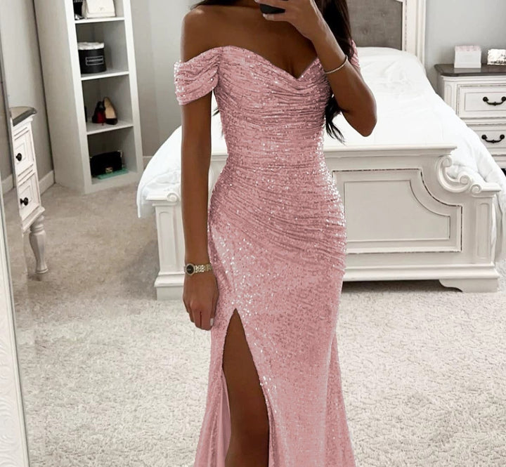 Woman in long off-shoulder sequin evening dress