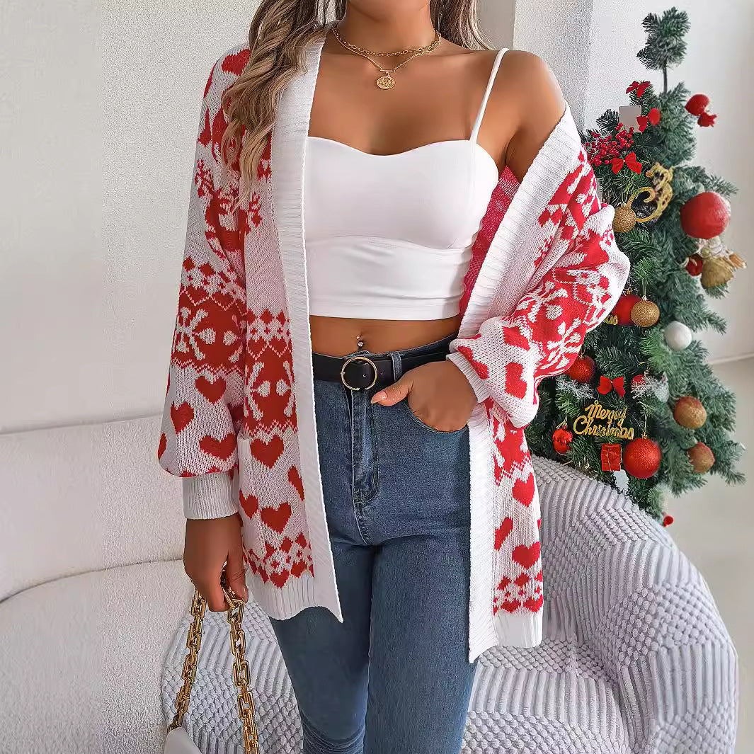 Woman in a reindeer knit cardigan