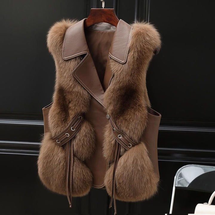 Woman in a short faux fur vest