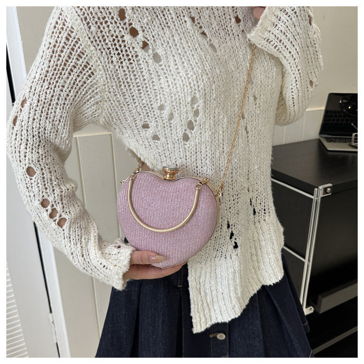 Heart-shaped metallic clutch with chain