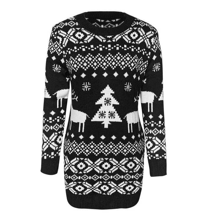 Woman in a reindeer jacquard sweater