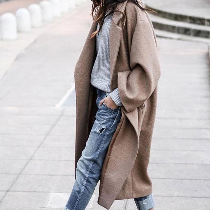 Woman in long oversized lapel coat