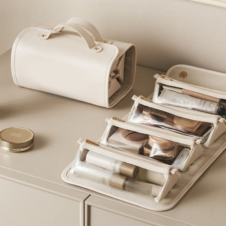 Cream toiletry bag with clear pouches
