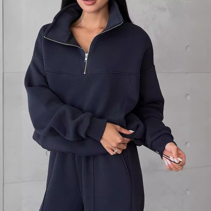 Woman in a half-zip fleece tracksuit
